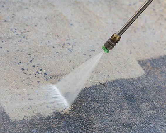 Outdoor floor cleaning with high pressure water jet